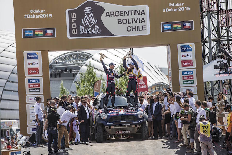 Nasser Al-Attiyah and Mathieu Baumel celebrating her victory on the podium of Technopolis on the Dakar 2015 in Buenos Aires, Argentina on January 17th, 2015