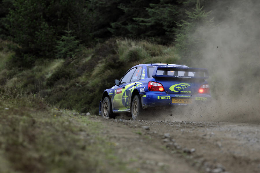 Subaru driver Petter Solberg in action on SS14 during leg three, Wales Rally GB 2005.