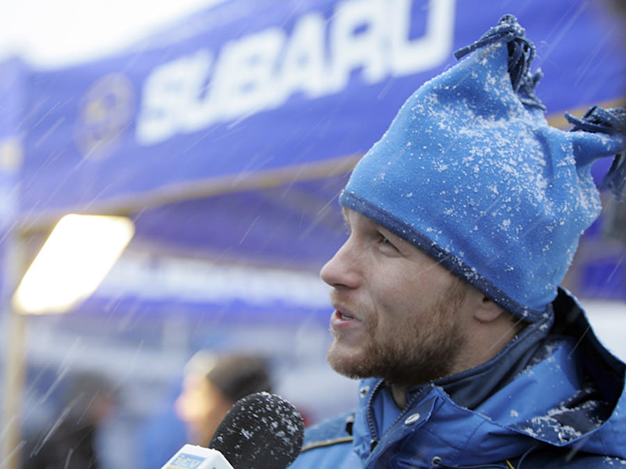 Subaru driver Petter Solberg is interviewed in the service park during pre-event shakedown, Swedish Rally 2005.