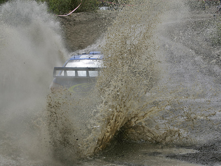 Subaru driver Petter Solberg in action in his Impreza WRC05 on special stage 4, during leg one Rally Mexico 2005.