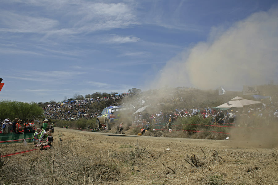 Subaru driver Petter Solberg flies his Impreza WRC05 over a high speed jump on special stage 9, during leg two, Rally Mexico 2005.