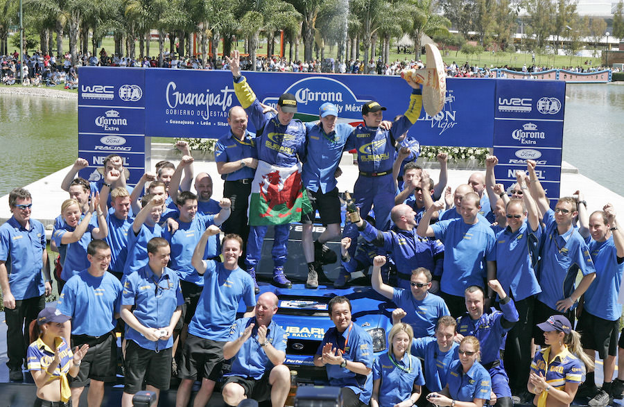 The SWRT celebrate Petter and Phils victory on the podium in Leon, Rally Mexico 2005.